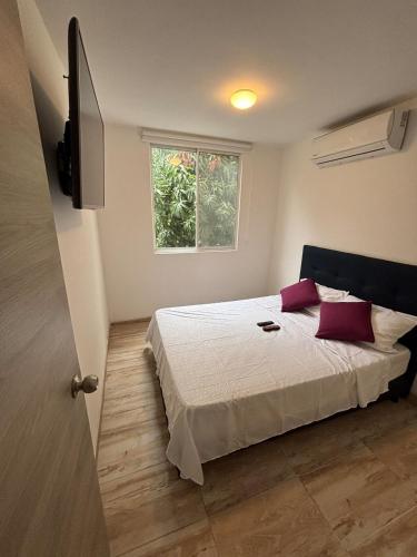 Ένα ή περισσότερα κρεβάτια σε δωμάτιο στο BAM - Hospedajes