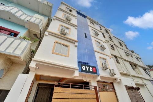 a building with a sign on the side of it at Hotel O Arvind Inn in Patna