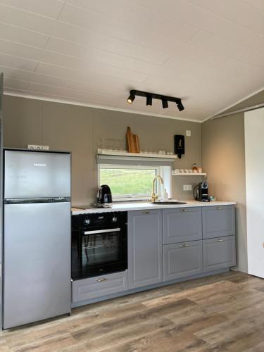 Η κουζίνα ή μικρή κουζίνα στο Kirkjuholt Guesthouse, 7