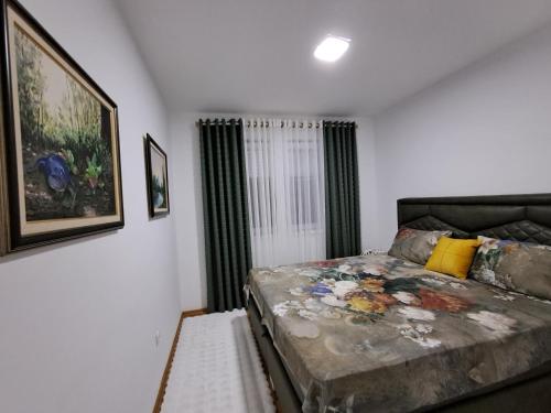 Ένα ή περισσότερα κρεβάτια σε δωμάτιο στο Apartman PETRA QUEEN