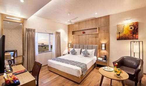 Postel nebo postele na pokoji v ubytování Hotel Tara International Near Delhi Airport