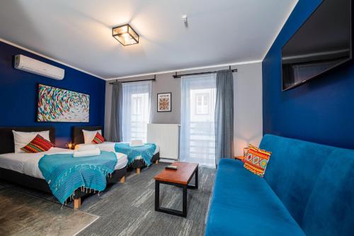 Postel nebo postele na pokoji v ubytování Kaktus Chill & Sleeping - 50 m od Rynku