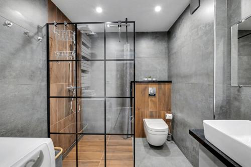 Koupelna v ubytování DreamHouse Apartament Zefir Północna 18B, Darłówko Wschodnie