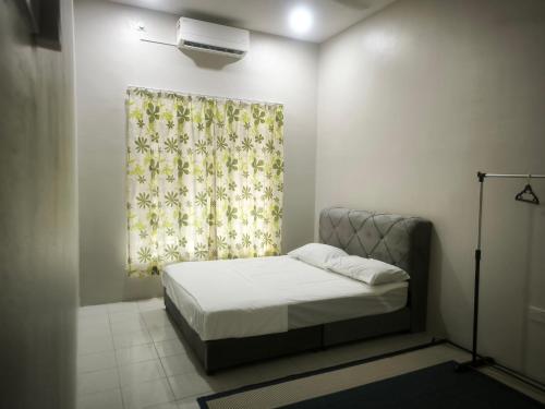 En eller flere senge i et værelse på damai homestay - feel like a home