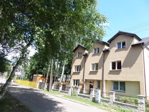 a house on the side of a road at Bea in Międzywodzie