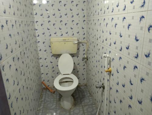 Ένα μπάνιο στο Sri Sai Dwarka Home Stay