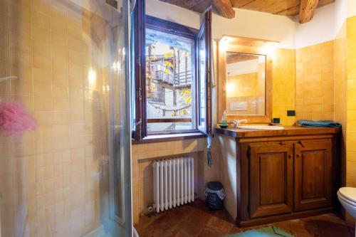 Koupelna v ubytování Casa antica Rango