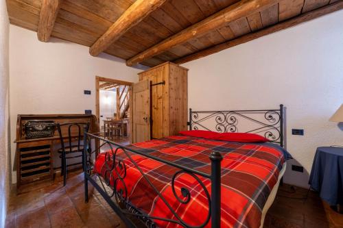 Postel nebo postele na pokoji v ubytování Casa antica Rango