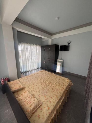 Ένα ή περισσότερα κρεβάτια σε δωμάτιο στο Leedors bnb