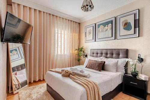Postel nebo postele na pokoji v ubytování Cozy apartment in Rabat Agdal