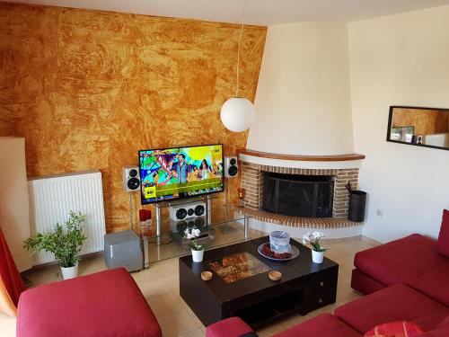 TV a/nebo společenská místnost v ubytování Seaside Paradise - Elegant & Modern Apartment