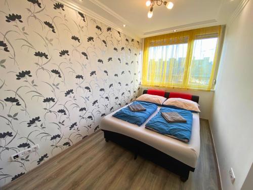 Postel nebo postele na pokoji v ubytování Beautiful air-conditioned apartment in the centre