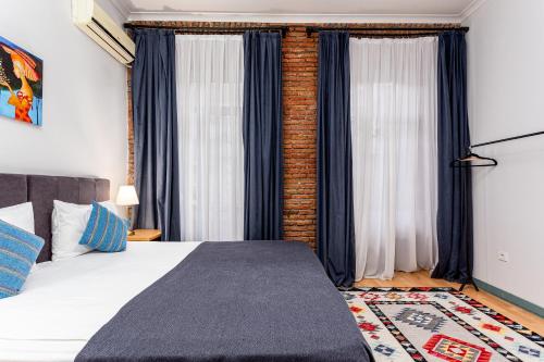 Ένα ή περισσότερα κρεβάτια σε δωμάτιο στο Ethnograph