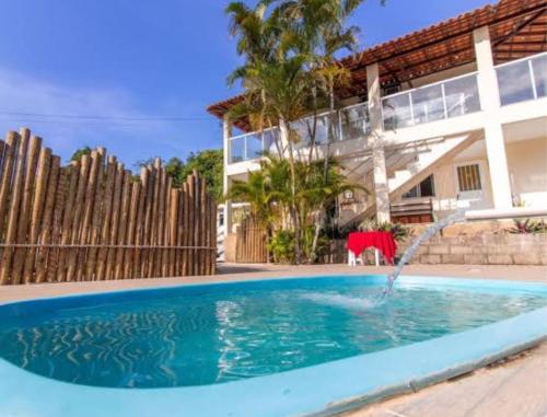 Bazén v ubytování Pousada Três Praias nebo v jeho okolí