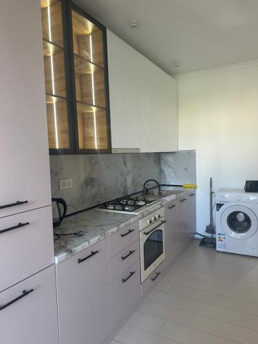 Köök või kööginurk majutusasutuses Квартира