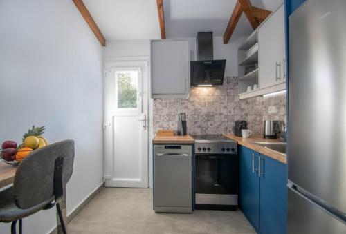 Kuchyň nebo kuchyňský kout v ubytování Green Oak Villa