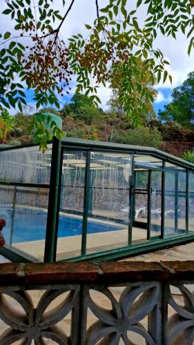 a glass structure sitting on top of a bench at Hotel Rural Los Jarales in Istán