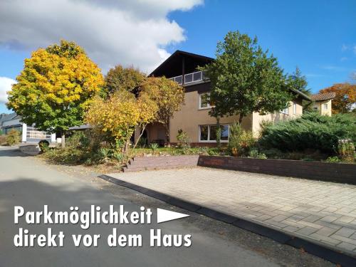 a house with the words parkyrickickickickickickickickick at Haus am Aartalsee in Bischoffen