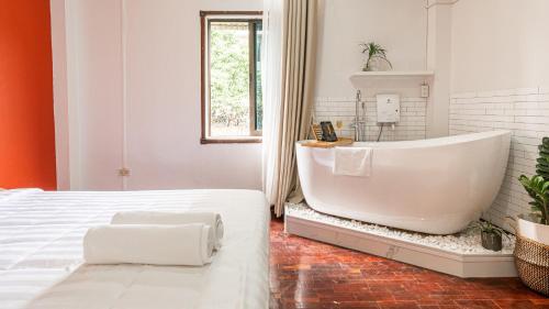 Postel nebo postele na pokoji v ubytování BlueHome 202