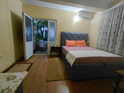 Ένα ή περισσότερα κρεβάτια σε δωμάτιο στο Snežana