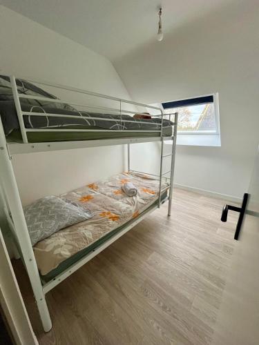 a bedroom with two bunk beds in a room at Villa Monica in Baud