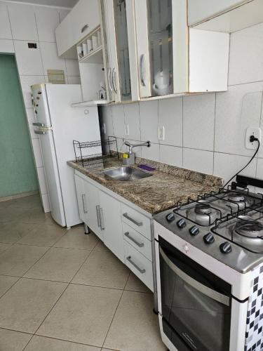 Køkken eller tekøkken på Edifício Açucena Beira Mar - Praia do Tombo