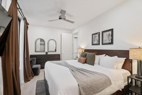 Postel nebo postele na pokoji v ubytování The Theodore New Orleans