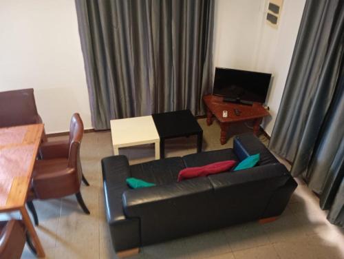 TV a/nebo společenská místnost v ubytování Rofix Appartement