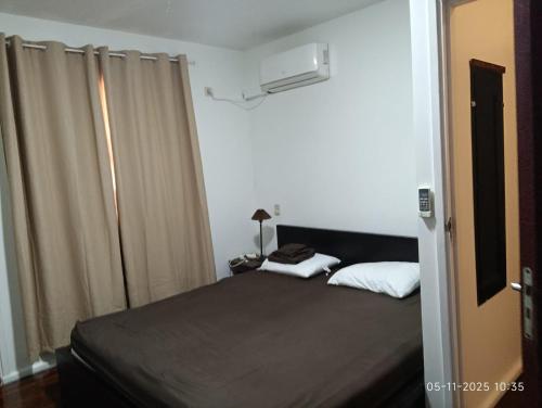 Postel nebo postele na pokoji v ubytování Rofix Appartement