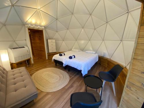 Ένα ή περισσότερα κρεβάτια σε δωμάτιο στο HuellaBlanca