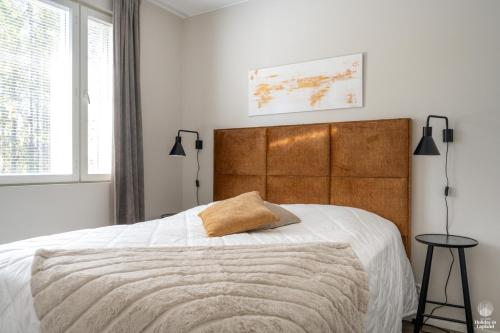 Postel nebo postele na pokoji v ubytování Holiday in Lapland - Postintie 3 A 6103