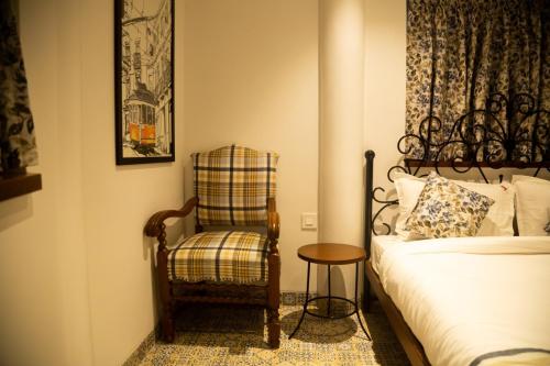 Un lugar para sentarse en Supra Homes & Service Apartments