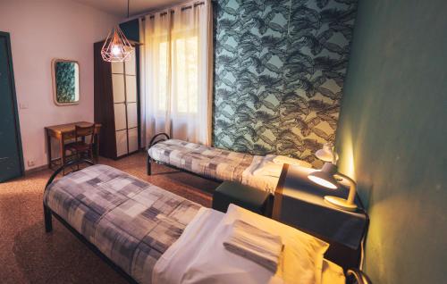 Postel nebo postele na pokoji v ubytování OstellOlinda