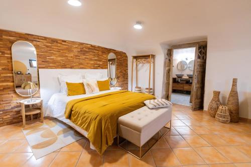 Postel nebo postele na pokoji v ubytování Le Mas Fraissinet