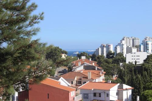 a view of a city with tall buildings at Cascais Jasmim Doce in Cascais