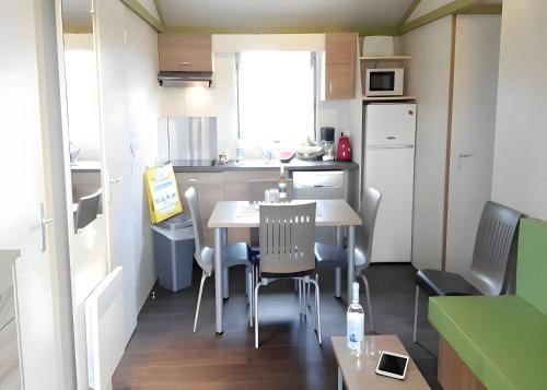 Kuchyň nebo kuchyňský kout v ubytování Samoa