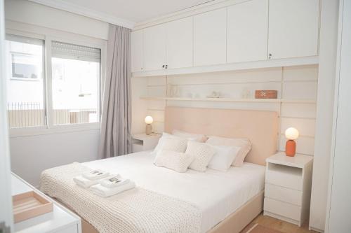 Ένα ή περισσότερα κρεβάτια σε δωμάτιο στο Apto moderno e elegante no Auxiliadora TV7638