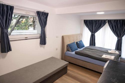 Postel nebo postele na pokoji v ubytování Novo