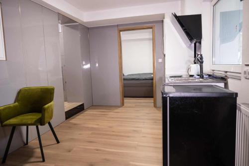 Kuchyň nebo kuchyňský kout v ubytování Novo