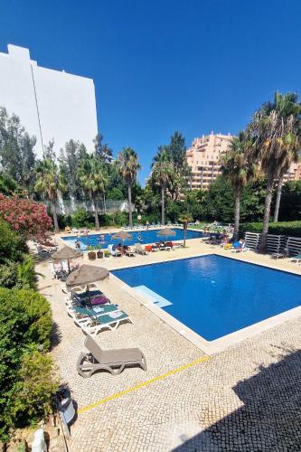 Beachfront Premium Apartment with Sunset, Pools & Sea View