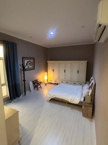 Postel nebo postele na pokoji v ubytování شقة الدرعية - مدخل خاص ودخول ذاتي