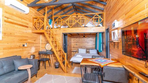 Posezení v ubytování Tringo Bungalov