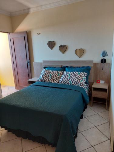 Ένα ή περισσότερα κρεβάτια σε δωμάτιο στο Villa Mediterraneo