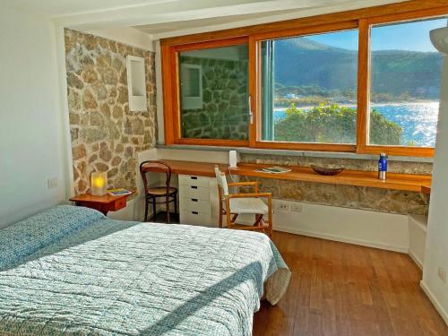 Postel nebo postele na pokoji v ubytování Villa The Boat