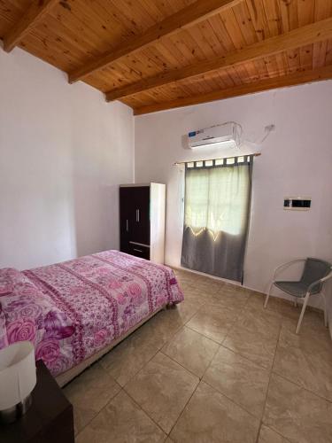 Postel nebo postele na pokoji v ubytování Cabañas Ernestina