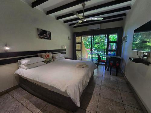 Giường trong phòng chung tại Hills and Dales Accommodation