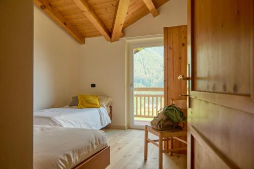 Postel nebo postele na pokoji v ubytování Bonetei 1