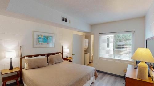 En eller flere senge i et værelse på Atlantic Breeze #1