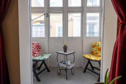 Χώρος καθιστικού στο Sliema 1BR Townhouse Escape