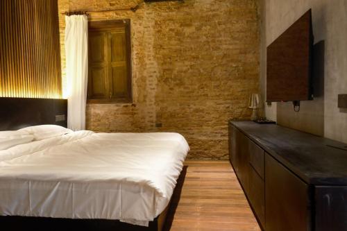 Postel nebo postele na pokoji v ubytování Playce Hotel